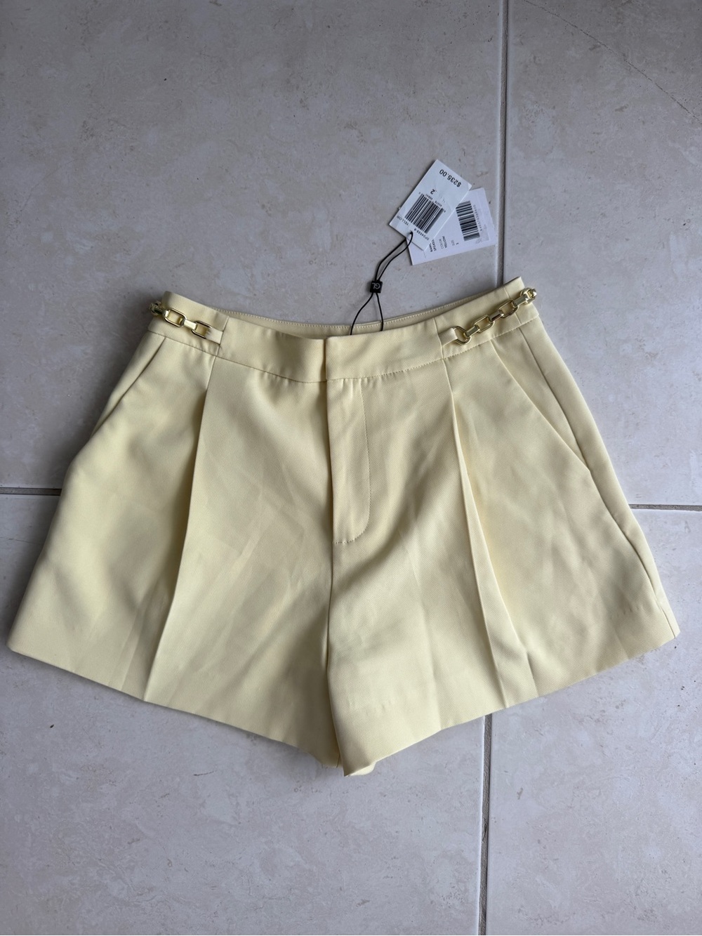 Generation Love Butter Yellow Pleated Shorts with Gold Chain Detail - Size 2